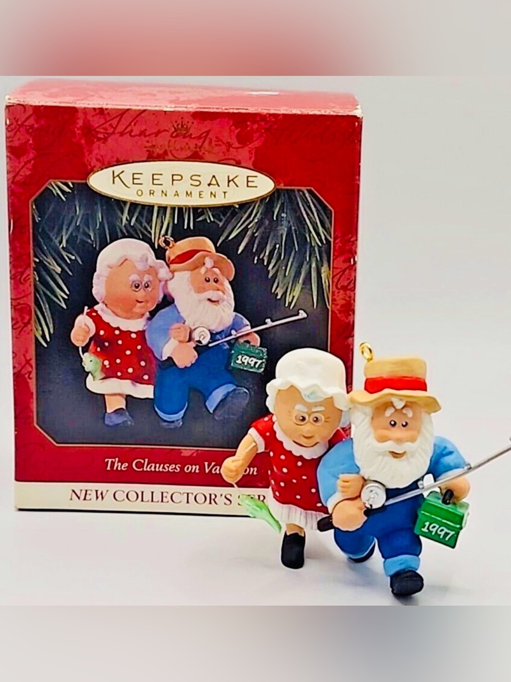 1997 The Clauses on Vacation (Red & Blue) Hallmark Ornament